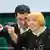Cem Oezdemir and Claudia Roth share podium after being reelected