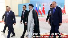 July 19, 2022, Tehran, Tehran, Iran: A handout photo made available by the Iranian presidential office shows Iran's President EBRAHIM RAISI (C), Russian President VLADIMIR PUTIN (L), and Turkish President RECEP TAYYIP ERDOGAN (R) during a trilateral summit in Tehran, Iran, on 19 July 2022. The tripartite summit on Syria is held in the so-called Astana format and shall discuss the process in the conflict. (Credit Image: Â© Iranian Presidency via ZUMA Press Wire
