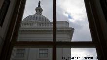 FILE PHOTO: A general view of the U.S. Capitol dome as seen from a window outside the Senate chamber in Washington December 18, 2013.REUTERS/Jonathan Ernst/File Photo