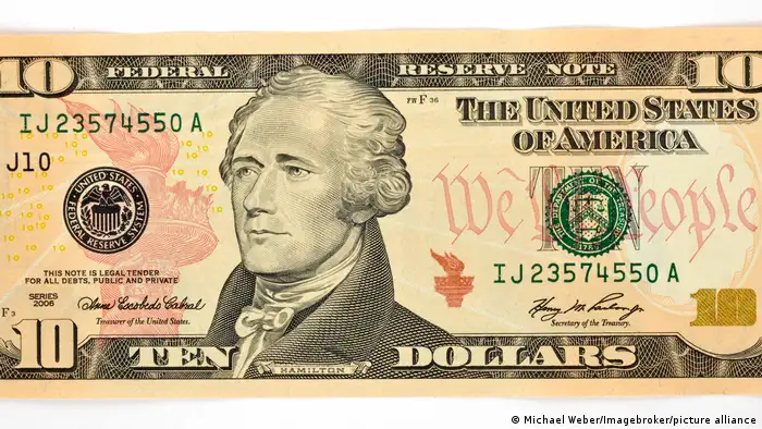 Picture of a US ten dollar note featuring the portrait of its first ...