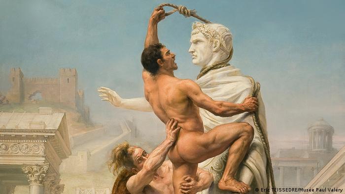 Joseph-Noël Sylvestres Gemälde Die Plünderung Roms durch die Barbaren im Jahr 410 (1890) zeigt einen Mann, der einer Statue einen Strick umbindet, ein anderer hebt ihn hoch