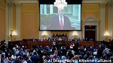 A video of former President Donald Trump is played on a screen as the House select committee investigating the Jan. 6 attack on the U.S. Capitol holds a hearing at the Capitol in Washington, Thursday, July 21, 2022. (Al Drago/Pool via AP)
