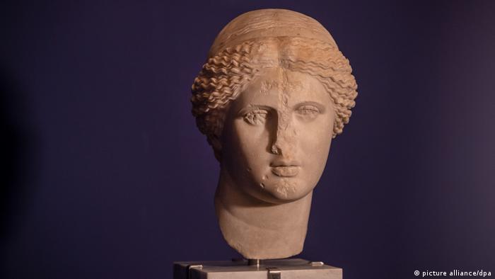 A statue of the head of Greek goddess Aphrodite, known in Latin as Venus