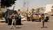 Libyan army forces and vehicles are stationed in a street in the country’s capital of Tripoli Libyan army forces and vehicles are stationed in a street in the country’s capital of Tripoli