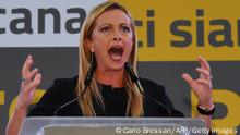 Head of the Brothers of Italy (Fratelli d'Italia, FdI) party, Giorgia Meloni speaks on stage during a centre-right coalition rally of the Lega, Brothers of Italy and Forza Italia parties for the upcoming regional elections, on September 18, 2020 in Florence, Tuscany. - Italians head to the polls this weekend, despite a coronavirus resurgence in Europe, for a referendum and Tuscany-led regional elections which analysts say could change the face of the far-right. (Photo by Carlo BRESSAN / AFP) (Photo by CARLO BRESSAN/AFP via Getty Images)