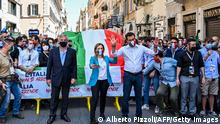 (From R) Head of the League party Matteo Salvini, head of the Brothers of Italy (FdI) party, Giorgia Meloni and co-founder of the Forza Italia (FI) party, Antonio Tajani march during a united rally for a protest against the government on June 2, 2020 on Via del Corso near Piazza del Popolo in Rome, as the country eases its lockdown aimed at curbing the spread of the COVID-19 infection, caused by the novel coronavirus. (Photo by Alberto PIZZOLI / AFP) (Photo by ALBERTO PIZZOLI/AFP via Getty Images)