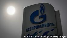 The logo of Russia's energy giant Gazprom is pictured at one of its petrol stations in Moscow on May 11, 2022. - Russian gas transiting Ukraine for Europe dropped on May 11 after Kyiv said it was suspending flows along a key route as Moscow pushes its military operation. The move fuels fears that the Kremlin's campaign in its pro-Western neighbour could see gas supplies to Europe via Ukraine cut off at a time when prices have already soared. (Photo by Natalia KOLESNIKOVA / AFP) (Photo by NATALIA KOLESNIKOVA/AFP via Getty Images)