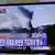 Der Artillerie-Angriff vom November im südkoreanischen Fernsehen (Foto: AP)