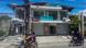 A damaged house is seen after a strong quake hit Bangued, Abra province A damaged house is seen after a strong quake hit Bangued, Abra province