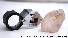 This undated handout picture released by Lucapa Diamond Company Limited on July 27, 2022 shows a 170 carat pink diamond -- dubbed The Lulo Rose -- that was discovered at the Lulo mine in Angola's diamond-rich northeast region. (Photo by Handout / LUCAPA DIAMOND COMPANY LIMITED / AFP) / RESTRICTED TO EDITORIAL USE - MANDATORY CREDIT AFP PHOTO / LUCAPA DIAMOND COMPANY LIMITED / - NO MARKETING NO ADVERTISING CAMPAIGNS - DISTRIBUTED AS A SERVICE TO CLIENTS