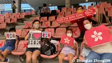 27.7.2022, Japan, China VS Hong Kong on the last day of 2022 EAFF E-1 Football Championship. Supporters of Team Hong Kong cheer and hold signs.