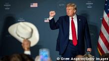 WASHINGTON, DC - JULY 26: Former U.S. President Donald Trump acknowledges the crowd after speaking during the America First Agenda Summit, at the Marriott Marquis hotel July 26, 2022 in Washington, DC. Former U.S. President Donald Trump returned to Washington today to deliver the keynote closing address at the summit. The America First Agenda Summit is put on by the American First Policy Institute, a conservative think-tank founded in 2021 by Brooke Rollins and Larry Kudlow, both former advisors to former President Trump. (Photo by Drew Angerer/Getty Images)
