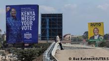 FILE PHOTO: Banners of Kenya's opposition leader and presidential candidate Raila Odinga of the Azimio la Umoja (Declaration of Unity) coalition(R), and Kenya's Deputy President William Ruto and presidential candidate for the United Democratic Alliance (UDA) and Kenya Kwanza political coalition, are seen at the road side in Nairobi, Kenya, July 25, 2022. REUTERS/Baz Ratner/File Photo