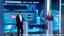 26.07.2022 *** Liz Truss, right, and Rishi Sunak during The Sun's Showdown: The Fight for No10, the latest head-to-head debate for the Conservative Party leader candidates, at TalkTV's Ealing Studios, west London, Tuesday July 26, 2022. (Dominic Lipinski/PA via AP)