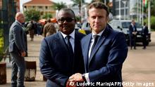 28.07.2022 *** French President Emmanuel Macron (R) meets with Guinee Bissau's President Umaro Sissoco Embalo upon his arrival at the presidential palace in Bissau on July 28, 2022. (Photo by Ludovic MARIN / AFP) (Photo by LUDOVIC MARIN/AFP via Getty Images)
