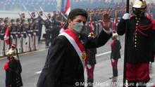 Peruvian President Pedro Castillo waves to journalists as he arrives at the Cathedral for Mass prior to Independence Day celebrations and his annual address to Congress in Lima, Peru, Thursday, July 28, 2022. Castillo will give his second State of the Nation address to lawmakers as the nation celebrates 201 years of independence. (AP Photo/Martin Mejia)