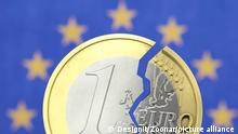 A broken one euro coin (symbolic)