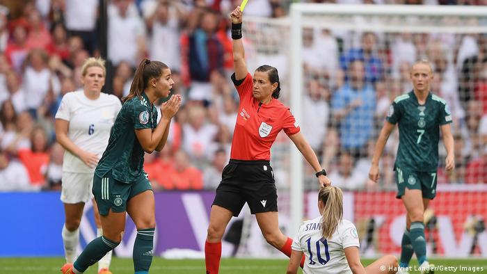 Germany's Lena Oberdorf is shown a yellow card during the Euro 2022 final