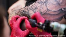 Tatuajes y piercings son más frecuentes entre quienes sufrieron abusos y abandono en la infancia