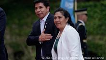 Peruvian President Pedro Castillo and first lady Lilia Paredes walk with U.S. Chief of Protocol Rufus Gifford, left, as they arrive for a dinner at the Getty Villa during the Summit of the Americas in Los Angeles, Thursday, June 9, 2022. (AP Photo/Jae C. Hong)