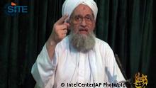 FILE -- In this undated file frame grab from video provided by IntelCenter, an American private terrorist threat analysis company, shows Al-Qaida's leader Ayman Al-Zawahri in a still image from a web posting by al-Qaida's media arm, as-Sahab, Wednesday July 27, 2011. Al-Qaida's leader has urged Muslims in Arab Spring countries to unite to institute an Islamic state, while warning France that its intervention in Mali will be bogged down, in a 103-minute audio message posted on militant websites late Saturday, April 6, 2013. In the recording, al-Zawahri urged Muslims to liberate their lands, apply Islamic law, halt the plundering of Muslim wealth, support rebellious Muslims and oppressed people worldwide, and establish the Islamic Caliphate, or religious state. (AP Photo/IntelCenter, File) THE ASSOCIATED PRESS HAS NO WAY OF INDEPENDENTLY VERIFYING THE CONTENT, LOCATION OR DATE OF THIS PICTURE. NO SALES MANDATORY CREDIT, INTELCENTER
