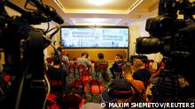 Journalists gather in front of a screen in a room of Russia's Supreme Court before a hearing on whether to designate Ukraine's Azov Regiment as a terrorist entity in Moscow, Russia August 2, 2022. REUTERS/Maxim Shemetov