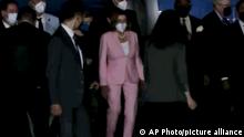 In this image taken from video, U.S. House Speaker Nancy Pelosi arrives in Taipei, Taiwan, Tuesday, Aug. 2, 2022. Pelosi arrived in Taiwan on Tuesday night despite threats from Beijing of serious consequences, becoming the highest-ranking American official to visit the self-ruled island claimed by China in 25 years. (AP Photo)