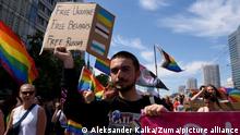 June 25, 2022, Warsaw, Warsaw, Poland: A demonstrator holds a sign reading ''Free Ukraine, Free Belarus, Free Russia'' as he takes part in the annual Warsaw pride parade on June 25, 2022 in Warsaw, Poland. Several thousands of people marched in the annual Warsaw pride parade, in Poland known as Equality march, to spread the ideas of equality, freedom and tollerance for the LGBTQ+ community. This year the parade will see the participation of the Kyiv Pride under the slogan ''Warsaw & Kyiv Pride marching for peace' (Credit Image: Â© Aleksander Kalka/ZUMA Press Wire