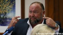 Alex Jones is called up to testify at the Travis County Courthouse during the his defamation trial, in Austin, U.S. August 2, 2022. Briana Sanchez/Pool via REUTERS