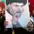 Seguidores de Al Sadr, con pancartas.