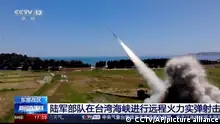 In this image taken from video footage run by China's CCTV, a projectile is launched from an unspecified location in China, Thursday, Aug. 4, 2022. China says it conducted precision missile strikes in the Taiwan Strait on Thursday as part of military exercises that have raised tensions in the region to their highest level in decades. (CCTV via AP)