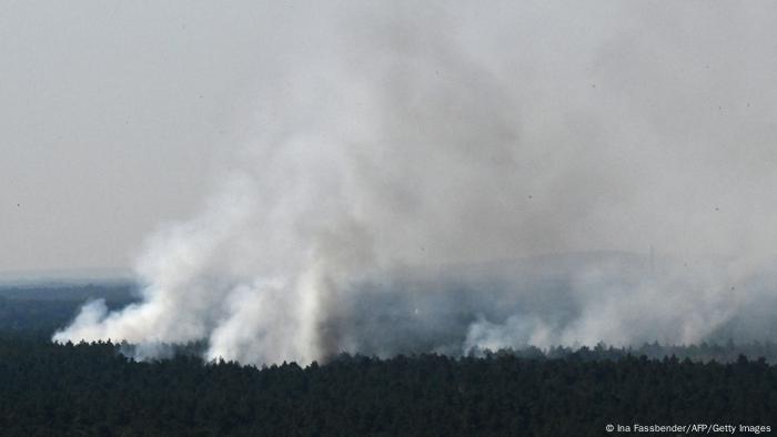 Smoke billows over Grunewald forest in Berlin