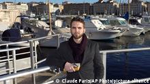 In this Wednesday, February 2, 2016 photo, Imam Ludovic-Mohamed Zahed, poses on the Old-Port, in Marseille, southern France. A gay imam from Algeria is working with an LGBT association in Marseille to counsel and protect young gay Muslims who make their way to the ancient port city. The Le Refuge group says it has helped 26 gays find shelter and start a new life in Marseille last year. Some eventually go back to their families. (AP Photo/Claude Paris)