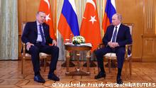 Russian President Vladimir Putin listens to Turkish President Tayyip Erdogan during a meeting in Sochi, Russia August 5, 2022. Sputnik/Vyacheslav Prokofyev/Pool via REUTERS ATTENTION EDITORS - THIS IMAGE WAS PROVIDED BY A THIRD PARTY.