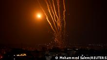 Trails of smoke from rockets fired by Palestinian militants into Israel are pictured, amid Israeli-Palestinian fighting, in Gaza City August 5, 2022. REUTERS/Mohammed Salem