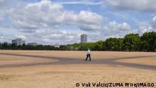 August 4, 2022, London, England, United Kingdom: A parched Hyde Park resembles a desert as England experiences its driest July in a century, according to several reports. Man-made climate change has led to heatwaves and drought conditions in much of the UK. London United Kingdom - ZUMAv130 20220804_zip_v130_004 Copyright: xVukxValcicx