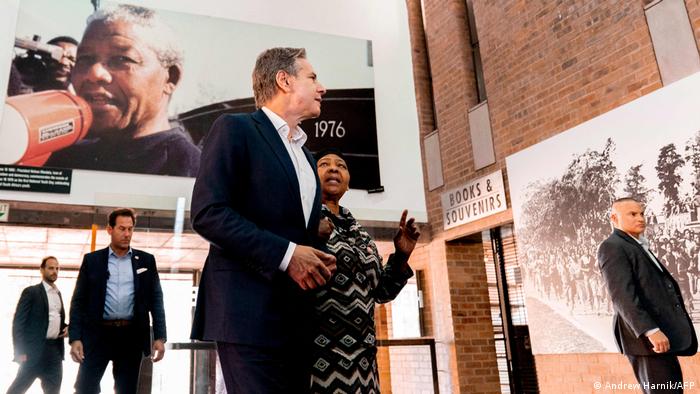 Antony Blinken (center left) and Antoinette Sithole, the sister of the late Hector Pieterson, tour the Hector Pieterson Memorial