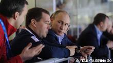ITAR-TASS: SOCHI, RUSSIA. FEBRUARY 16, 2014. Russia s deputy prime minister Arkady Dvorkovich, prime minister Dmitry Medvedev, and president Vladimir Putin, (L-R) watch a group stage ice hockey match between Slovakia and Russia in the Bolshoi Ice Palace during the Sochi 2014 Winter Olympic Games. PUBLICATIONxINxGERxAUTxONLY RE1399F6
ITAR TASS Sochi Russia February 16 2014 Russia s Deputy Prime Ministers Arkady Dvorkovich Prime Ministers Dmitry Medvedev and President Vladimir Putin l r Watch A Group Stage Ice Hockey Match between Slovakia and Russia in The Ice Palace during The Sochi 2014 Winter Olympic Games PUBLICATIONxINxGERxAUTxONLY