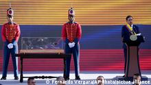 President Gustavo Petro speaks, next to the sword of independence hero Simon Bolivar, after taking the oath of office in Bogota, Colombia, Sunday, Aug. 7, 2022. (AP Photo/Fernando Vergara)