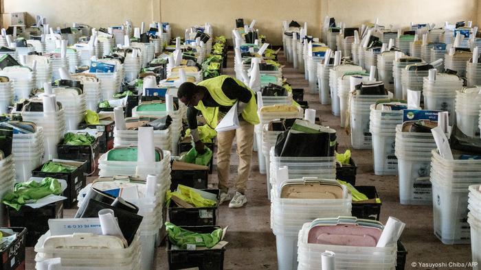 An Independent Electoral and Boundaries Commission (IEBC) staff member checks all electoral materials before handing them over to presiding officers from each polling station.