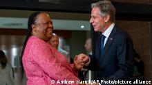 Secretary of State Antony Blinken is greeted by South Africa's Foreign Minister Naledi Pandor as he arrives for a meeting at the South African Department of International Relations and Cooperation in Pretoria, South Africa, Monday, Aug. 8, 2022. Blinken is on a ten day trip to Cambodia, Philippines, South Africa, Congo, and Rwanda. (AP Photo/Andrew Harnik, Pool)