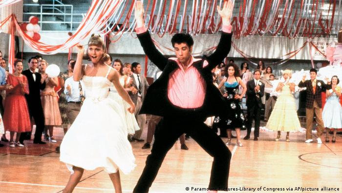 Szene aus dem Filmmusical Grease mit Olivia Newton-John und John Travolta