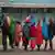 People line up to vote at the Oltepesi Primary School, Kajiado County in Nairobi, Kenya