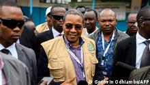 Former president of Tanzania Jakaya Kikwete (C), who is the head of East African Community (EAC) election observation mission, talks to media in Old Kibera polling station during Kenya's general election in Kibera on August 9, 2022. (Photo by Gordwin Odhiambo / AFP)