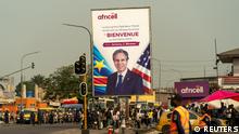 A billboard with U.S. Secretary of State Antony Blinken stands by the road as his motorcade moves through Kinshasa, Democratic Republic of the Congo, August 9, 2022. Andrew Harnik/Pool via REUTERS