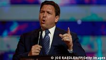 TAMPA, FLORIDA - JULY 22: Florida Gov. Ron DeSantis speaks during the Turning Point USA Student Action Summit held at the Tampa Convention Center on July 22, 2022 in Tampa, Florida. The event features student activism and leadership training, and a chance to participate in a series of networking events with political leaders. Joe Raedle/Getty Images/AFP (Photo by JOE RAEDLE / GETTY IMAGES NORTH AMERICA / Getty Images via AFP)