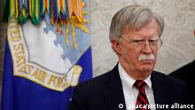 US National Security Advisor John Bolton stands near by as President Donald Trump meets with Danny Burch, a former hostage in Yemen, in the Oval Office at the White House March 6, 2019 in Washington, DC. Photo by Ting Shen/ABACAPRESS.COM