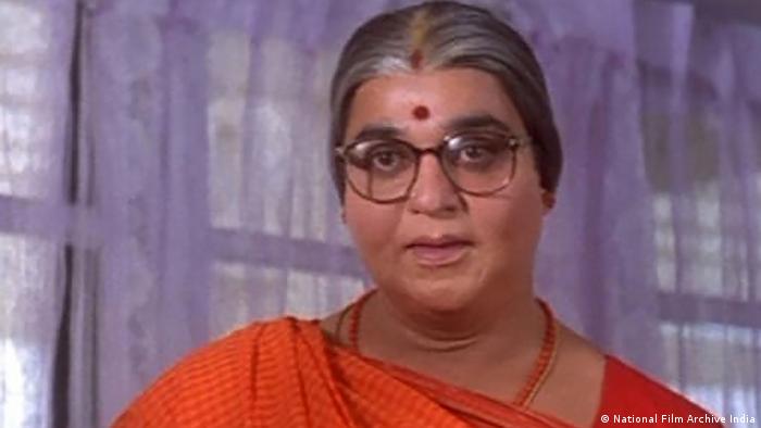 In a scene from the film Chachi 420, actor Kamal Haasan is dressed as a woman in a saree with a bindi on her forehead.