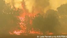 FILE PHOTO: Wildfire rages on Quinta do Lago in Portugal. July 13, 2022, in this still image taken from video. REUTERS TV/Luis Ferreira via REUTERS/File Photo