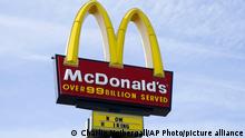 FILE - A sign is displayed outside a McDonald's restaurant, Tuesday, April 27, 2021, in Des Moines, Iowa. McDonald's announced Thursday, Aug. 10, 2022, that the company will start reopening restaurants in Ukraine in the coming months, a symbol of the war-torn country's return to some sense of normalcy and a show of support after the American fast-food chain pulled out of Russia. (AP Photo/Charlie Neibergall, File)